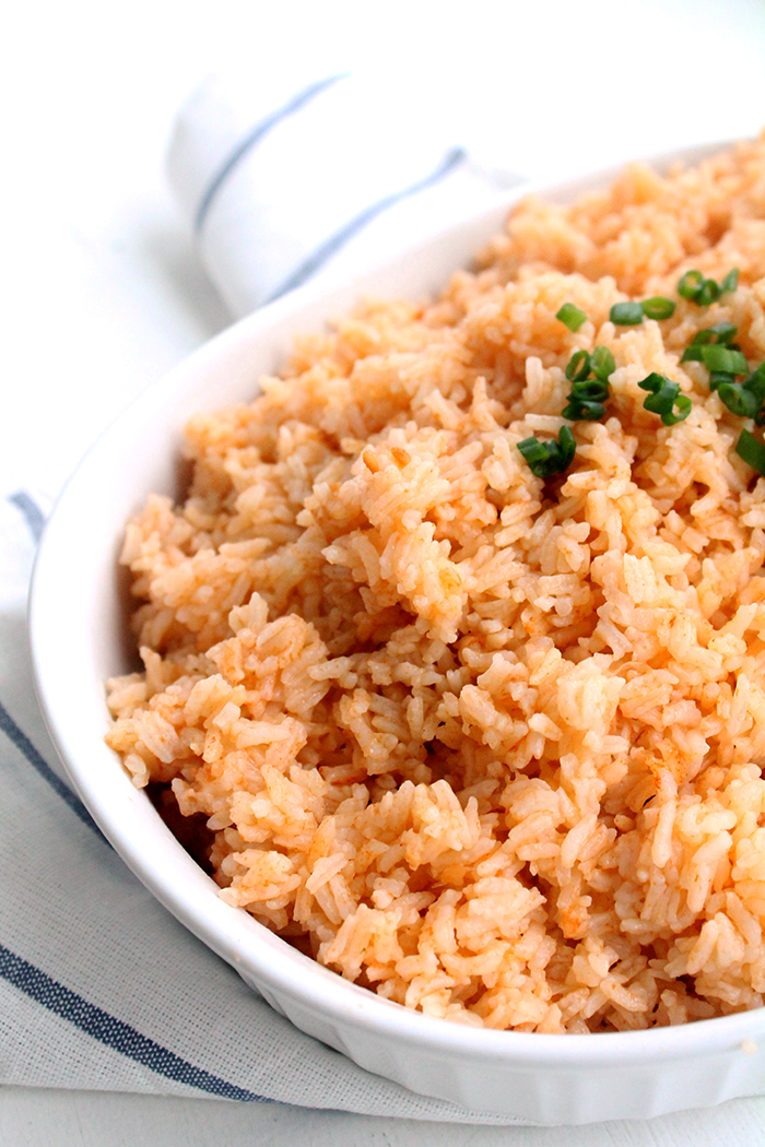 White dish of spanish rice that was cooked in the instant pot