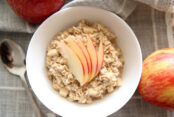 Apple Pie flavored oatmeal with sliced red apple on top.