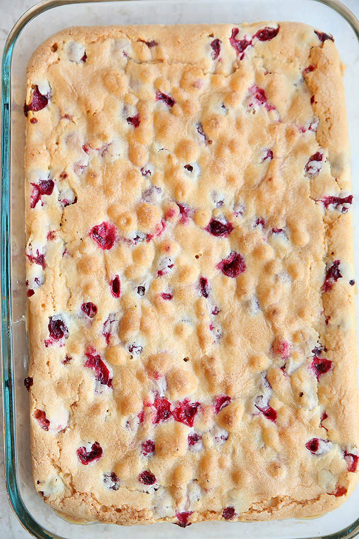 A whole Cranberry Christmas Cake in a 9x13 baking dish.