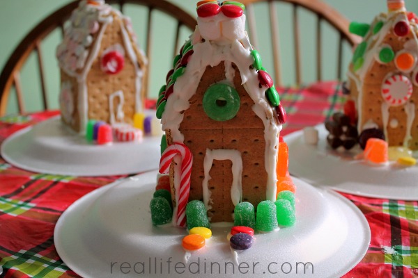 three little graham cracker gingerbread houses