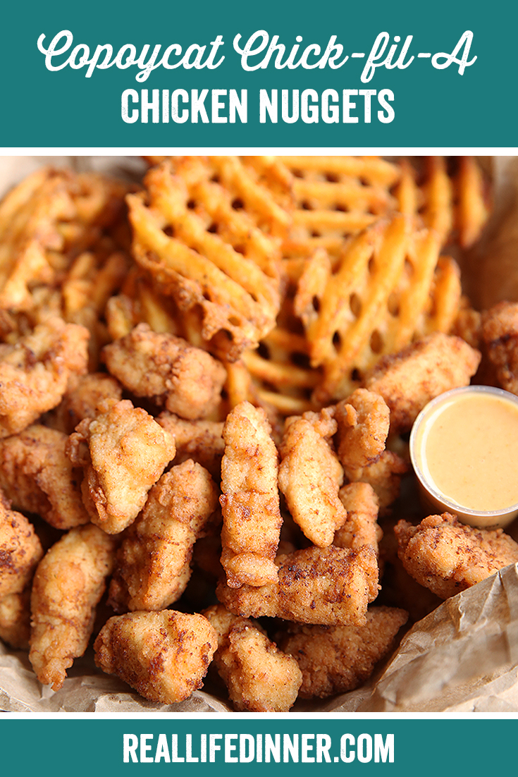 Pinterest photo of chicken nuggets with the text of the title of the recipe at the top.