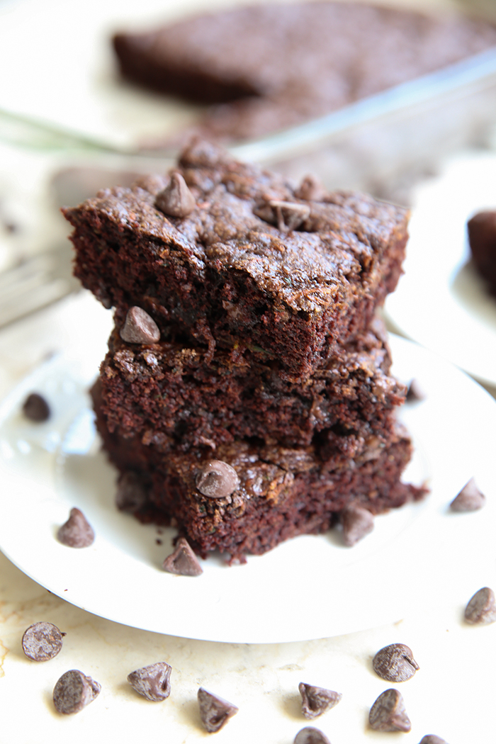 fudgy zucchini brownies stacked on top of each other