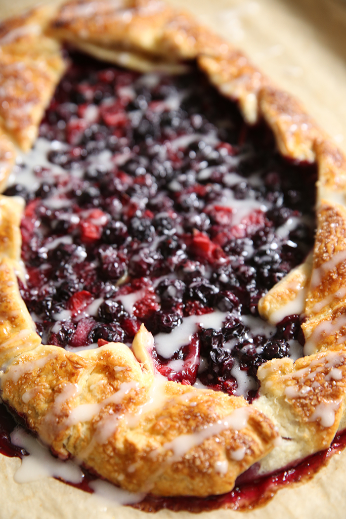 Easy Puff Pastry Berry Galette on parchment paper.