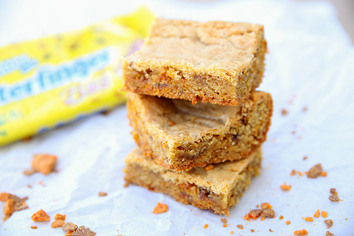 stack of butterfinger blondies one of the best cookie bars