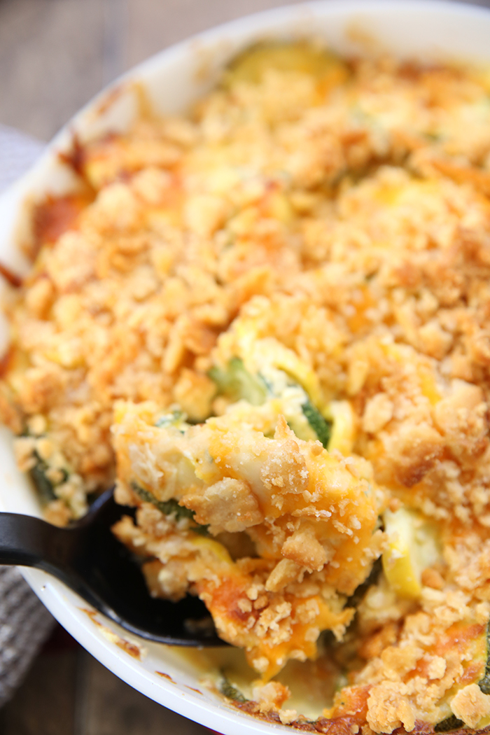 large baking dish of fabulous squash casserole. cheesy and topped with buttery cracker crumbs