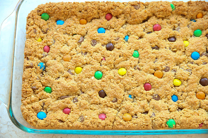 A glass 9x13 baking dish of Monster Cookie Bars