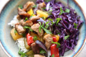 Sheet pan Hawaiian pork bowl with chopped red cabbage served over coconut rice.
