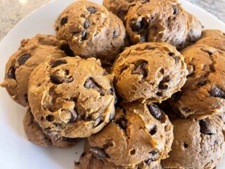 A plate full of pumpkin chocolate chip cookies.