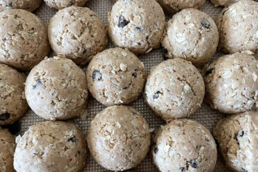Protein Power Balls sitting on a silicone baking mat.