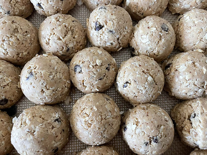 Protein Power Balls sitting on a silicone baking mat.