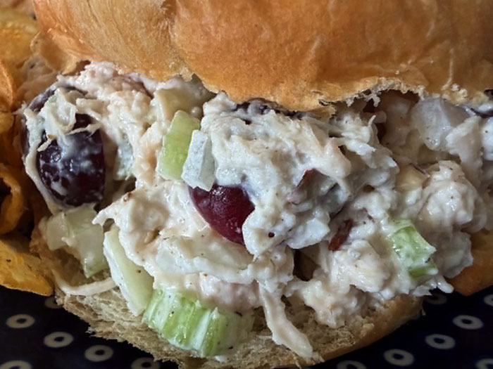 A croissant extra protein chicken salad sandwich.